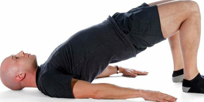 Performing the Arch exercise by a man to improve potency